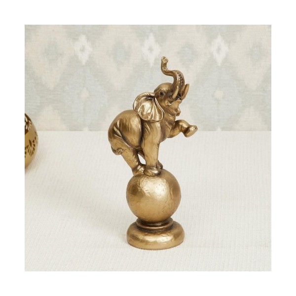 Elephant On Ball Figurine